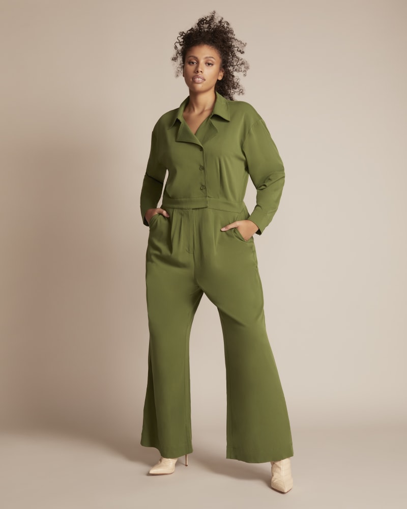 Front of a model wearing a size 14 Sheila Jumpsuit in Forest Green by 11 Honoré Collection. | dia_product_style_image_id:245306